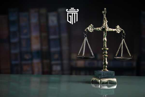 legal books and scales on a desk